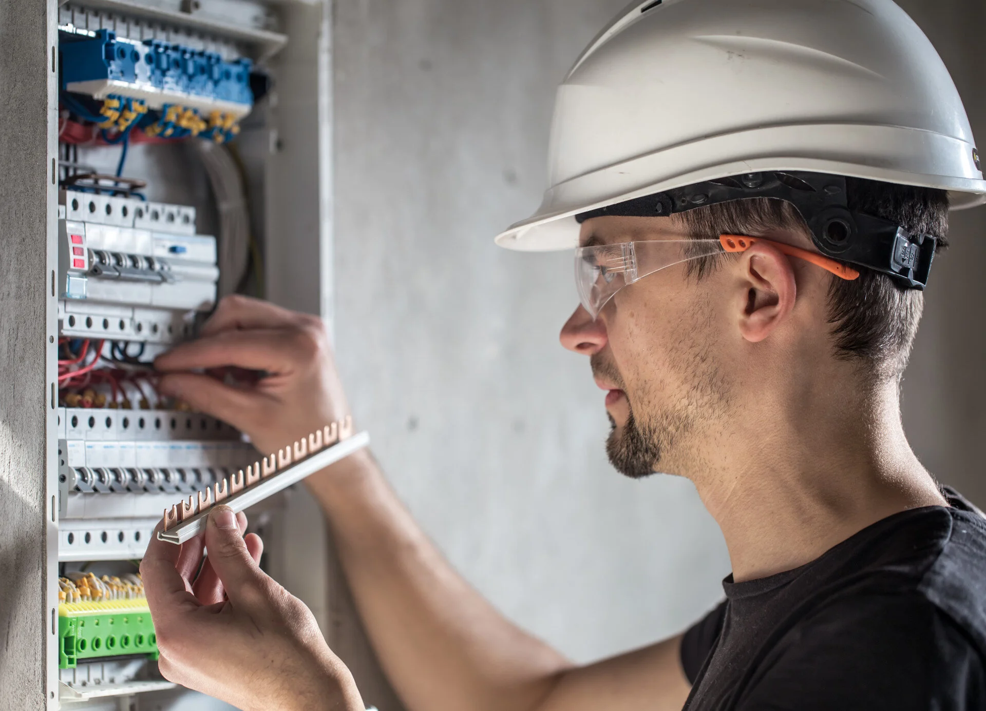Commercial electrician at work