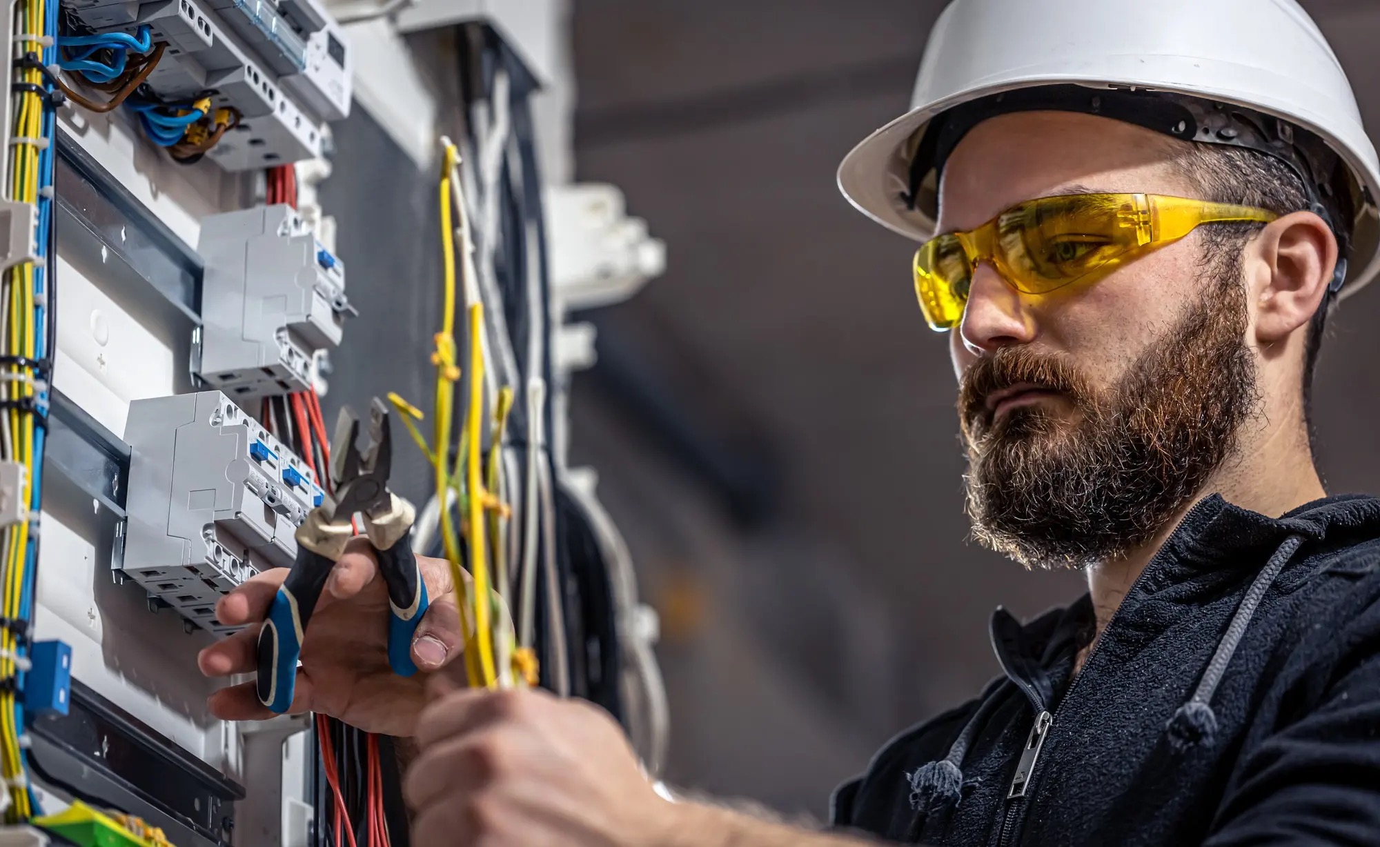 Electrician rewiring a property